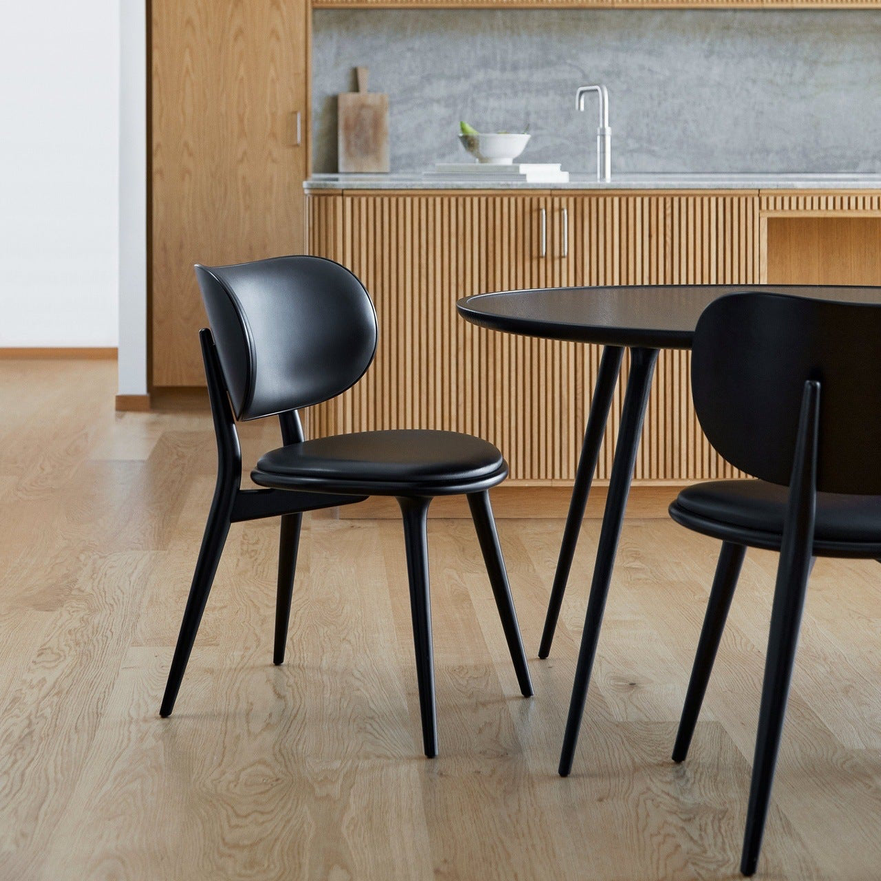 Mater The Dining Chair in solid wood styled in a dining room