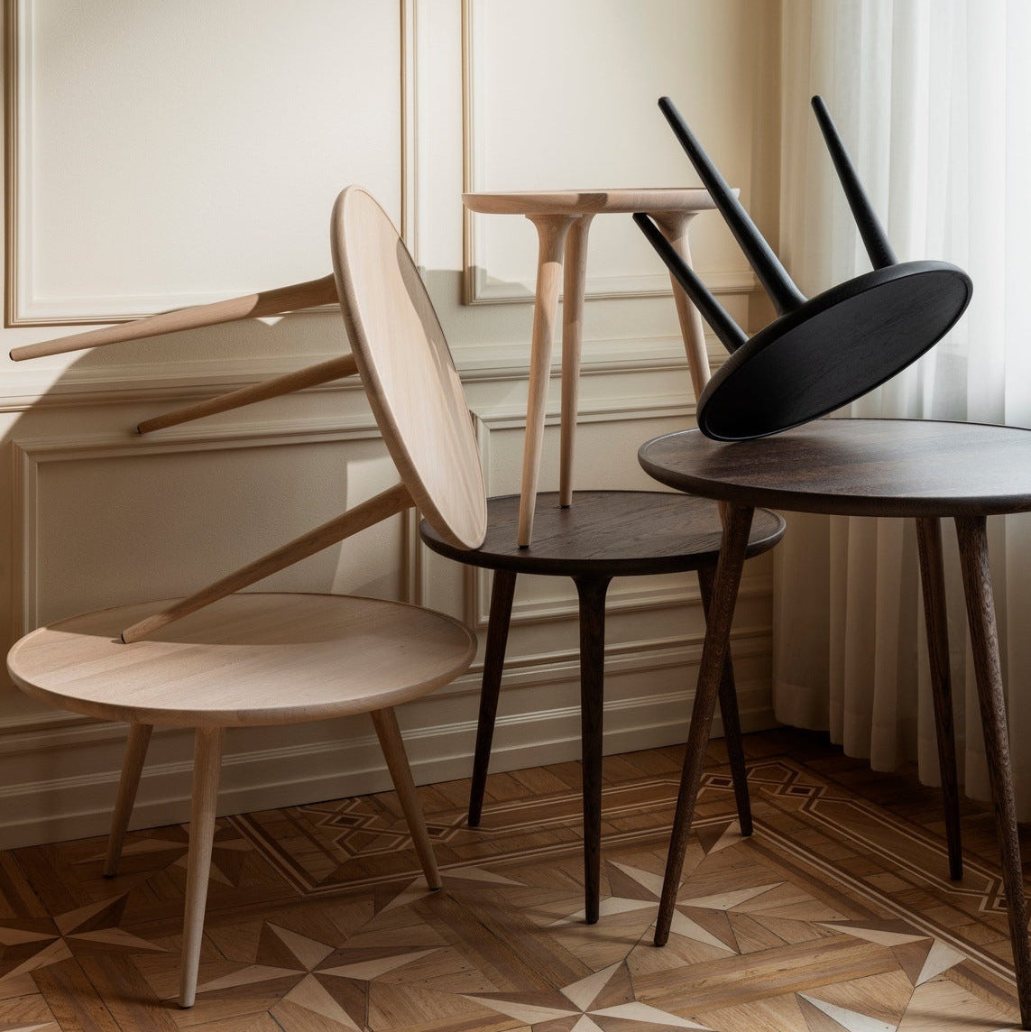 Mater Accent Cafe Table in solid wood styled in an interior setting