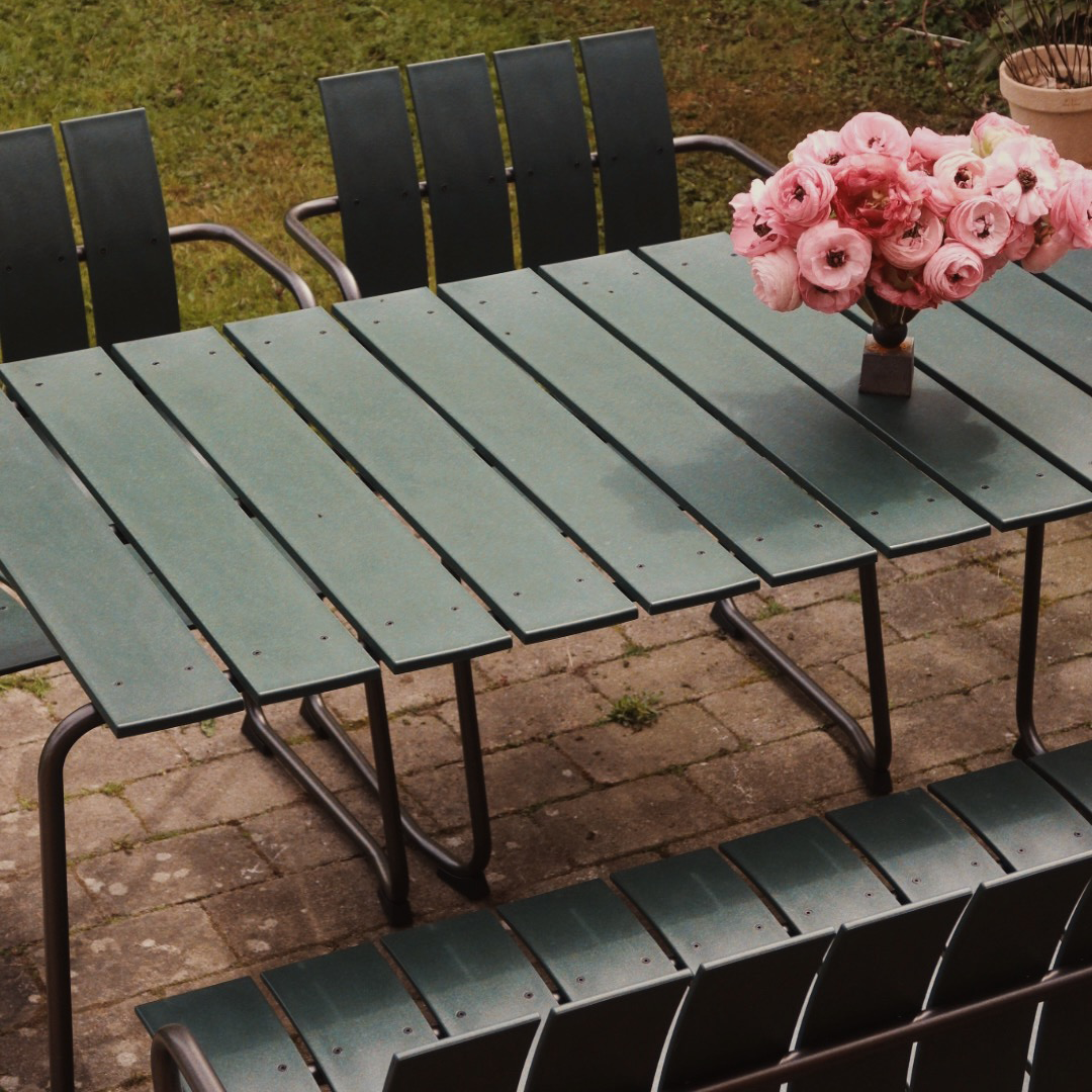 Mater Ocean Lounge Chair styled in an outdoor setting, slats of recycled plastic waste