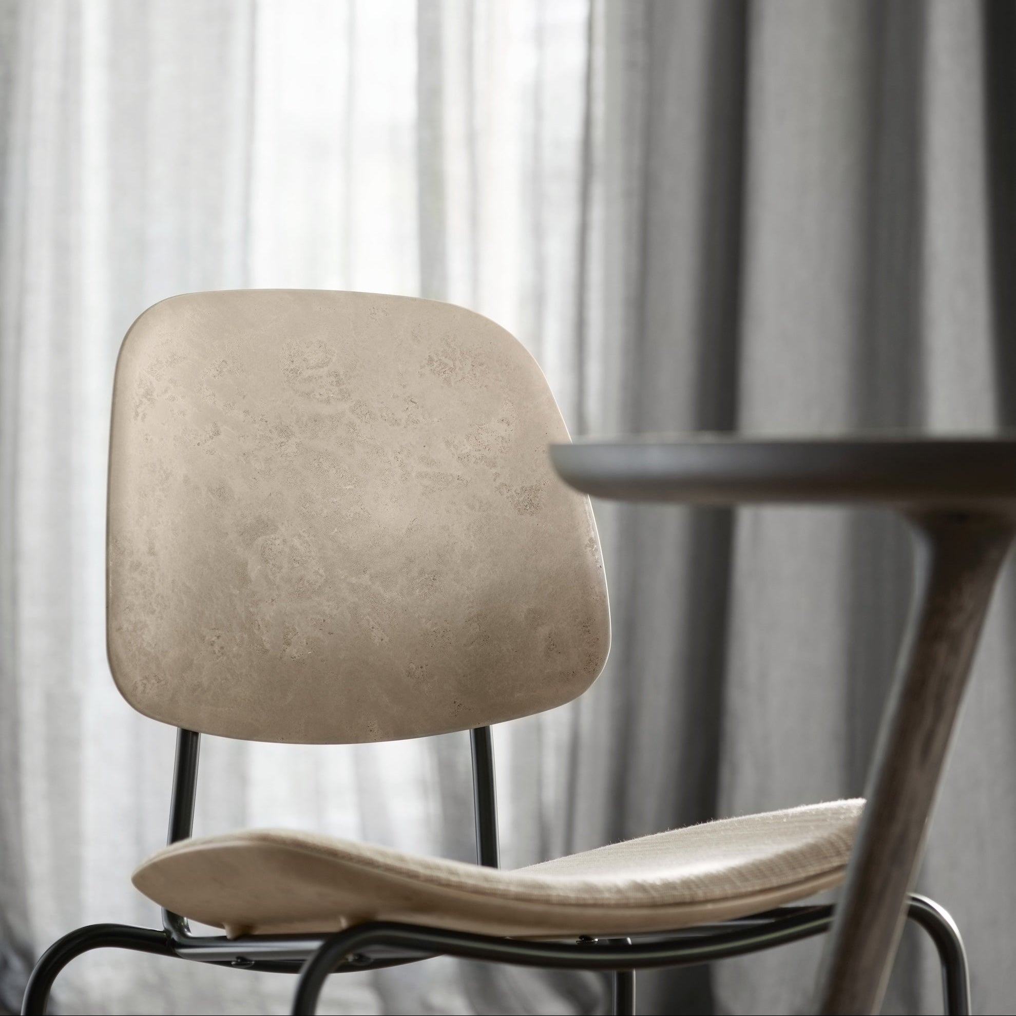 Mater Compound Dining Chair in solid wood styled in a dining room