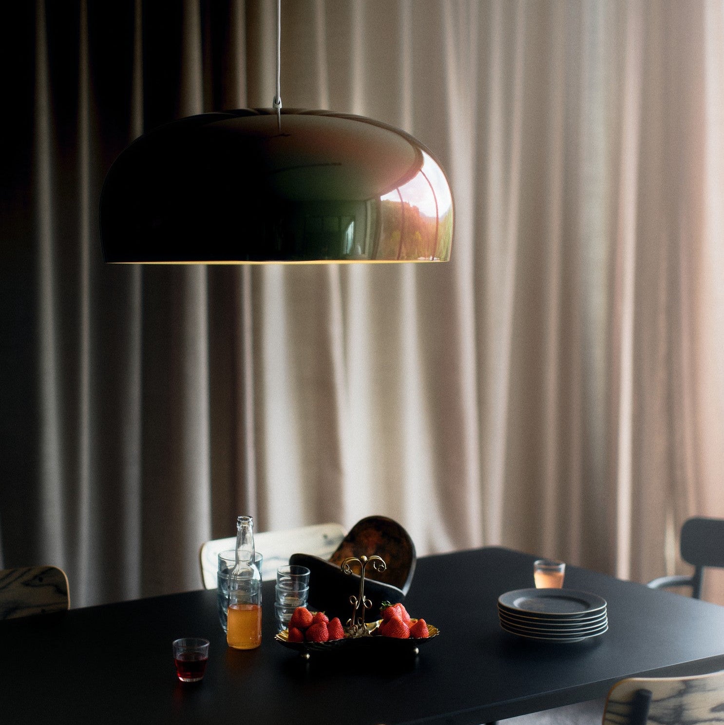 Petite Friture Brush Pendant Light styled in a designer interior