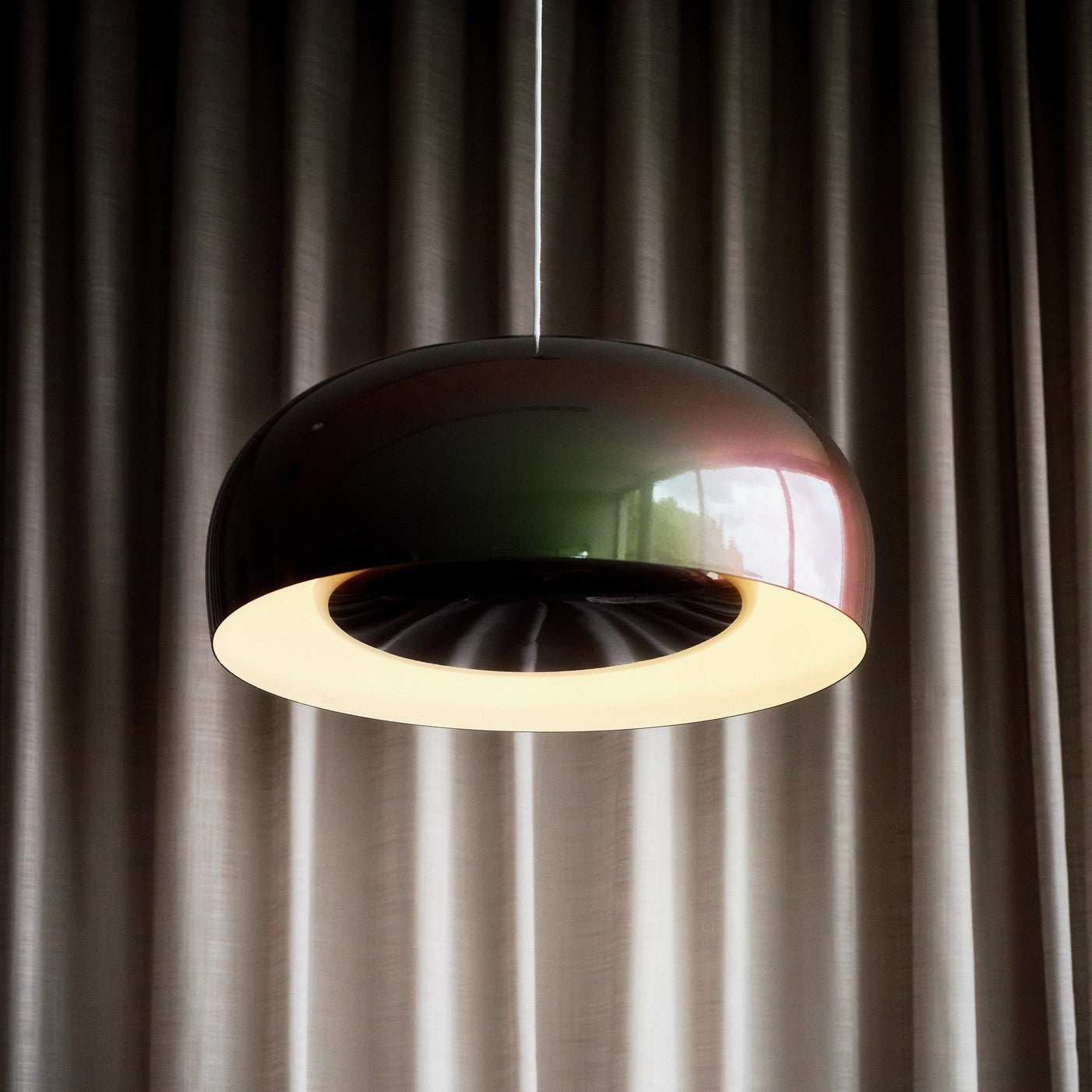 Petite Friture Brush Pendant Light styled in a designer interior
