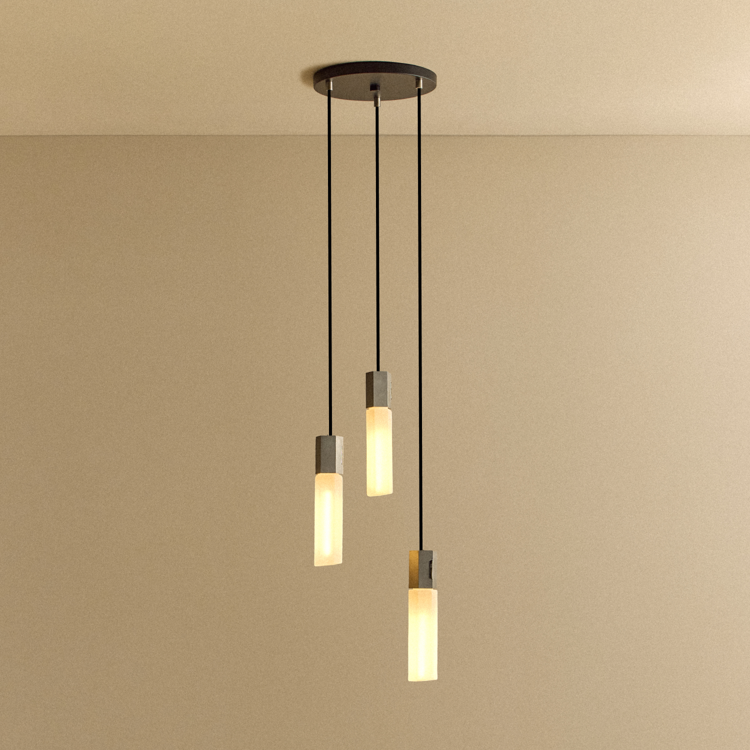 Basalt Triple Pendant by Tala in cast Stainless Steel, front view of the fixture