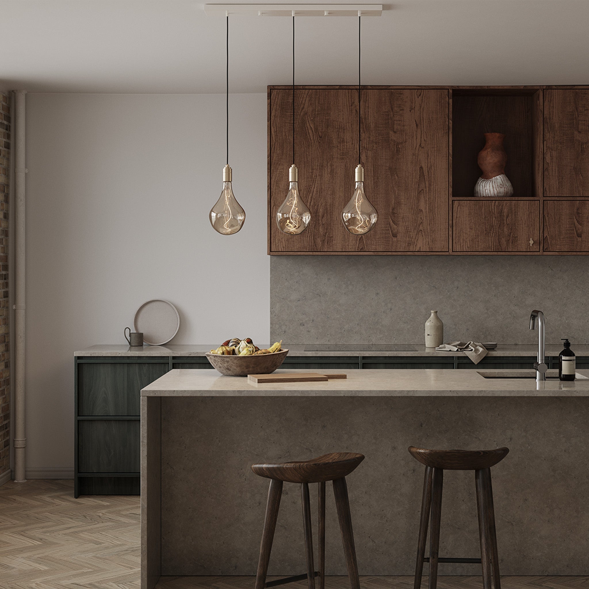Tala Linear Triple Pendant in Brass shown with Voronoi II bulbs, kitchen lifestyle rendering