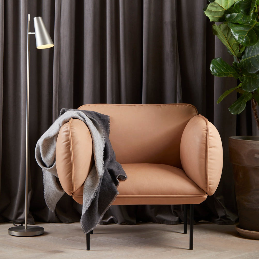 WOUD Cono Floor Lamp in powder-coated steel styled in a living room