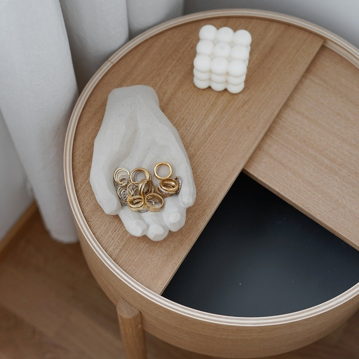 WOUD Arc Side Table in FSC-certified solid oak styled in a living room