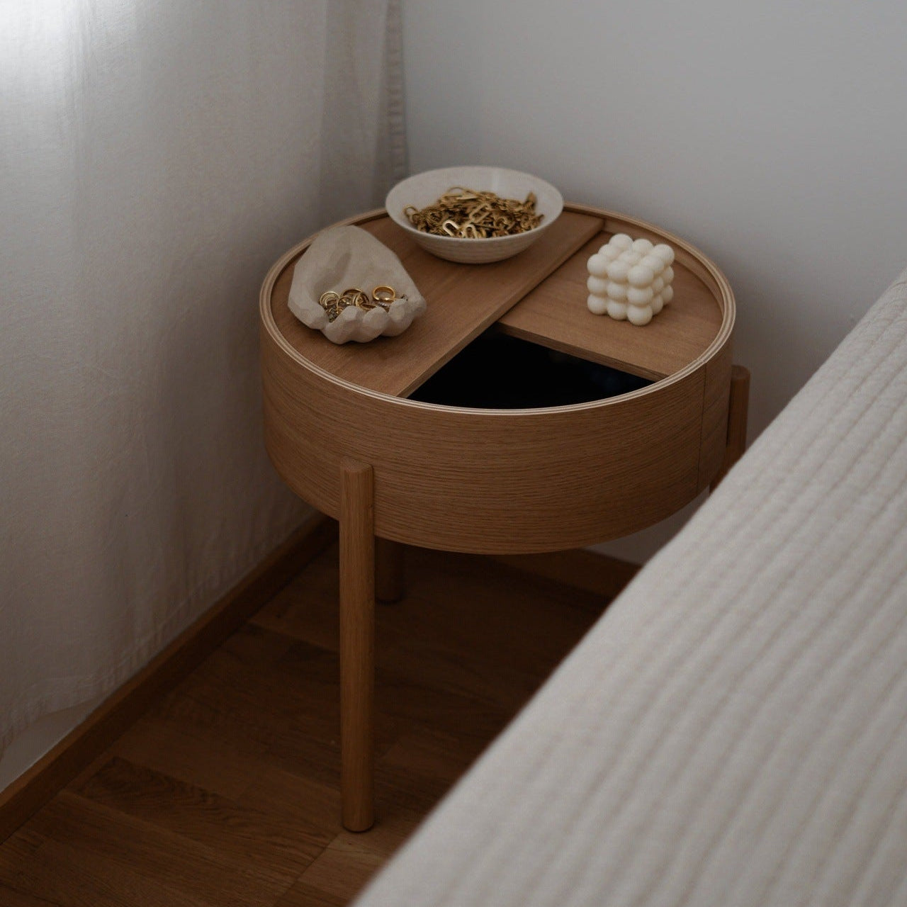 WOUD Arc Side Table in FSC-certified solid oak styled in a living room