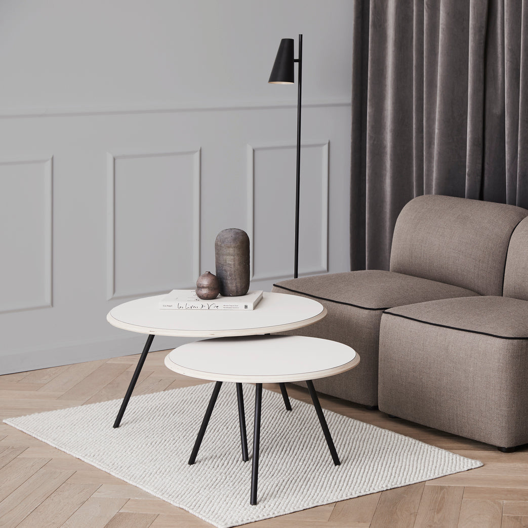 WOUD Cono Floor Lamp in powder-coated steel styled in a living room