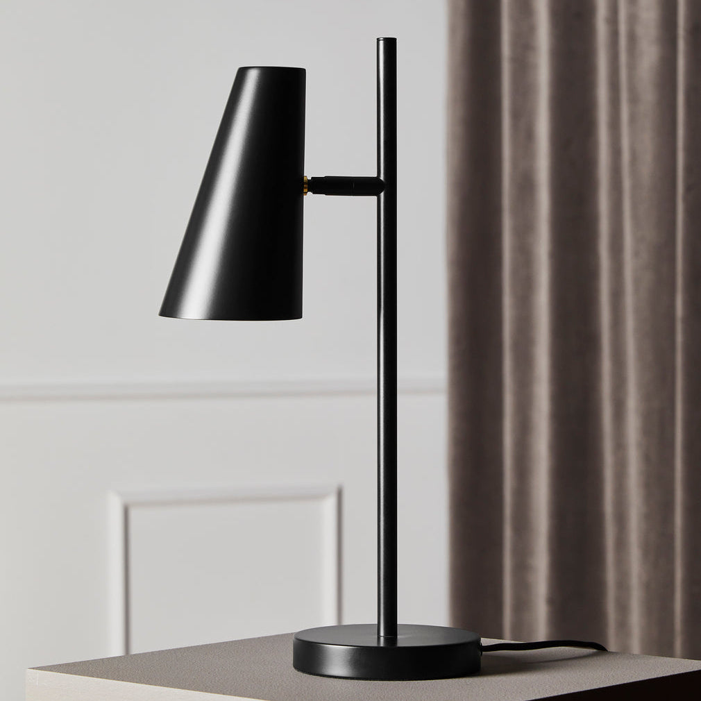 WOUD Cono Table Lamp in powder-coated steel styled in a living room