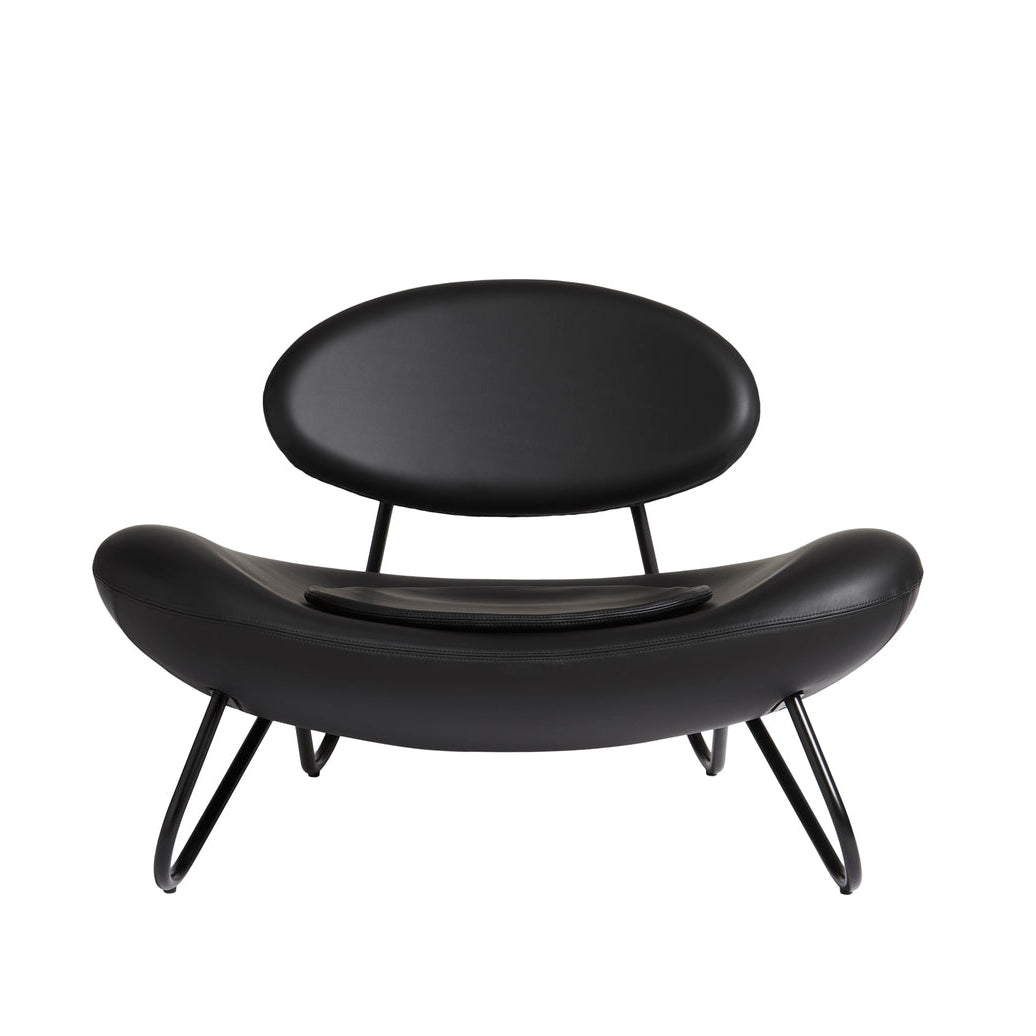 WOUD Meadow Leather Lounge Chair in black leather upholstery on a solid oak frame designed by Foersom & Hiort-Lorenzen