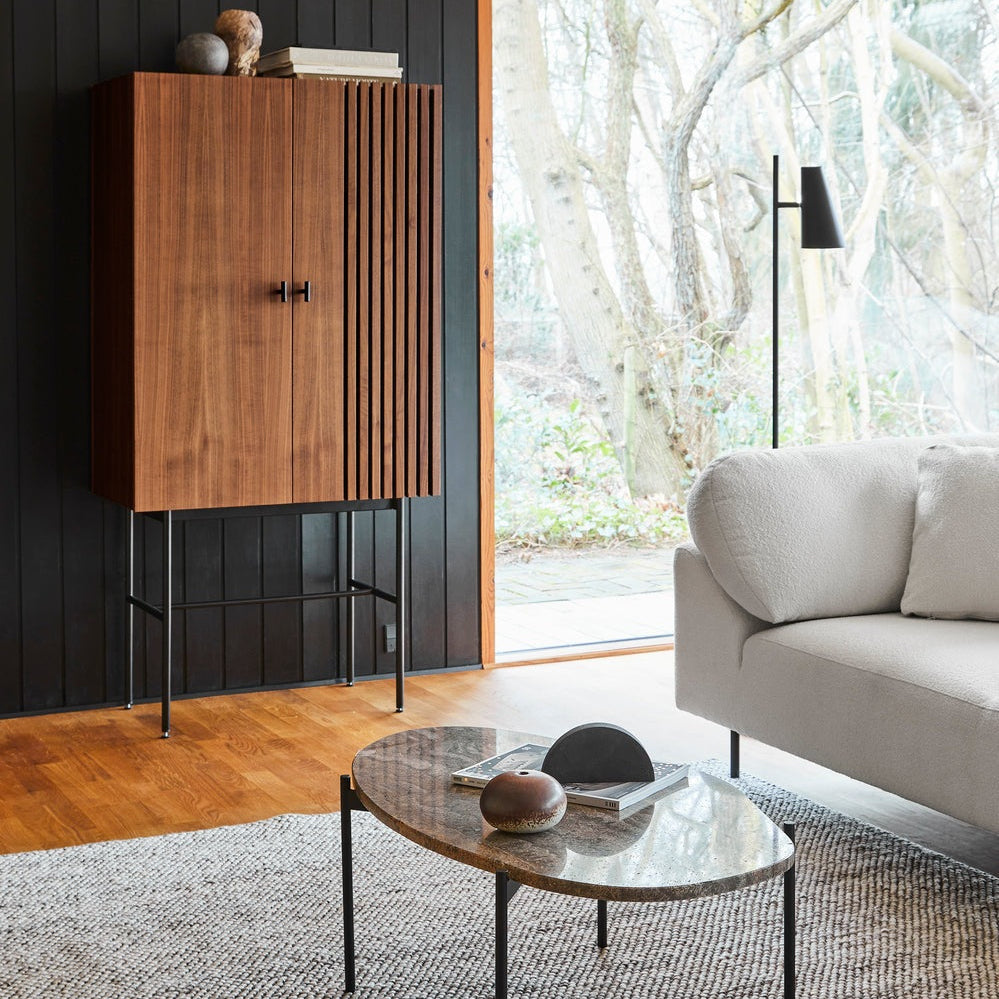WOUD Cono Floor Lamp in powder-coated steel styled in a living room