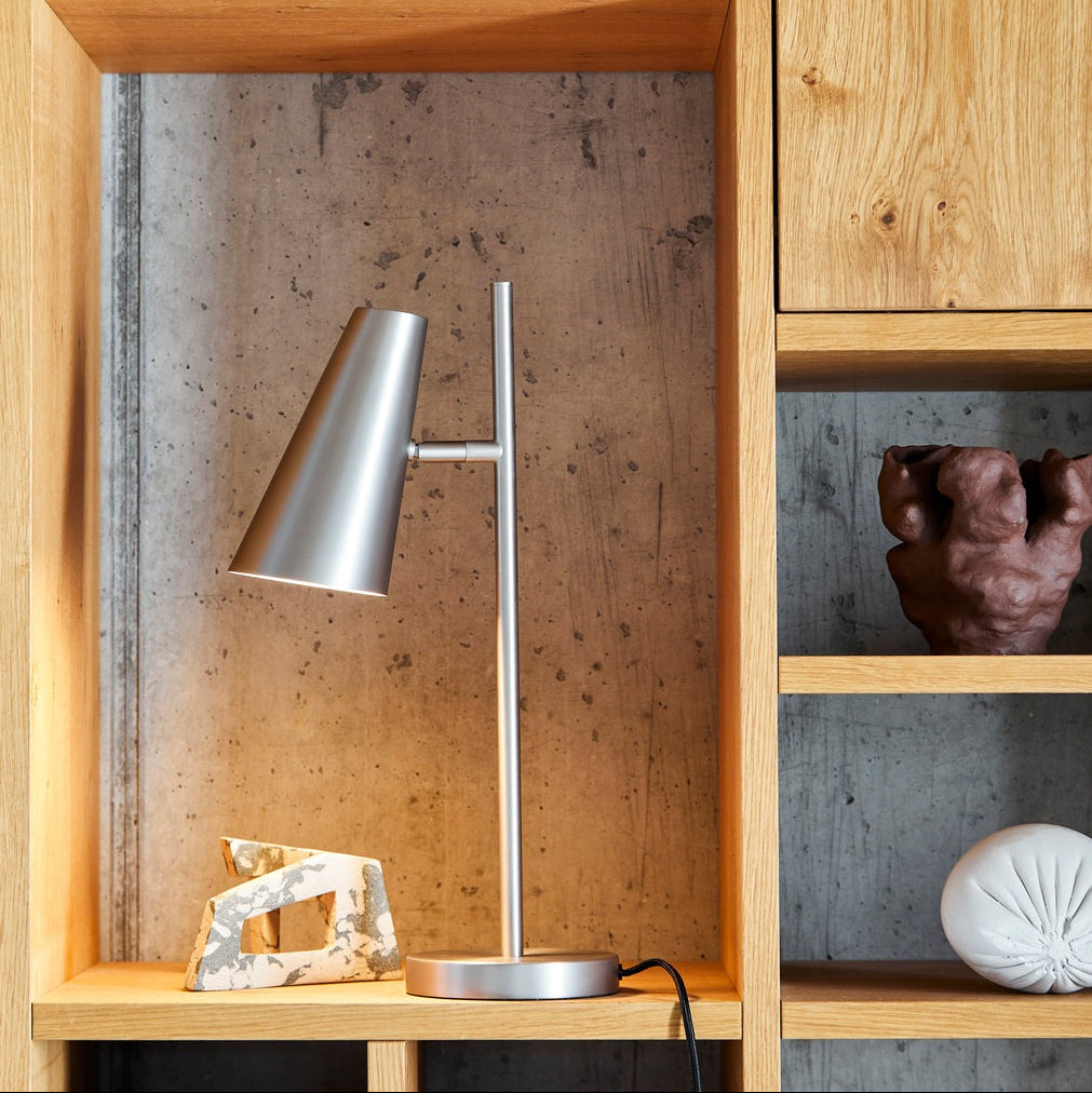 WOUD Cono Table Lamp in powder-coated steel styled in a living room