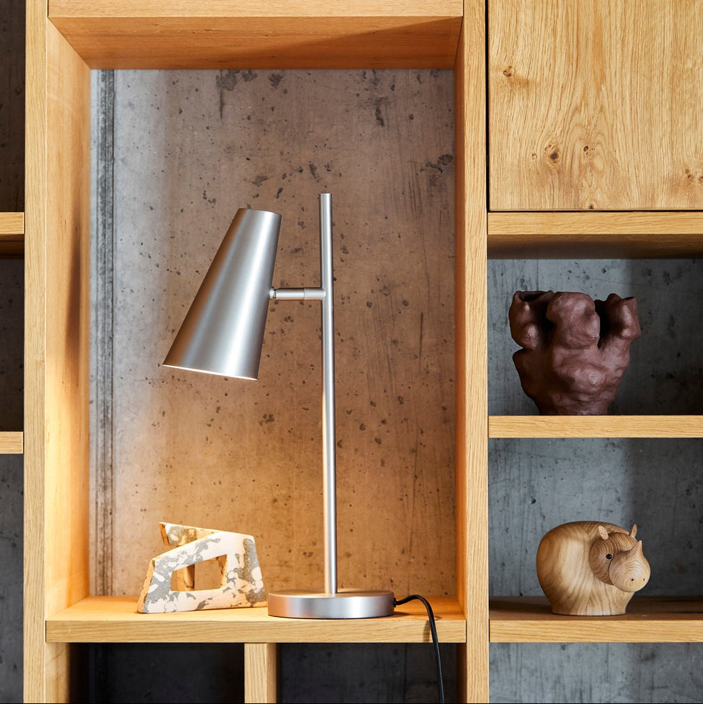 WOUD Cono Table Lamp in powder-coated steel styled in a living room