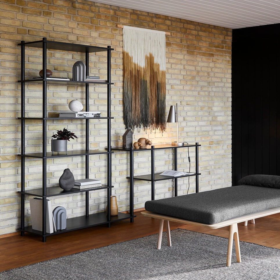 WOUD Cono Table Lamp in powder-coated steel styled in a living room
