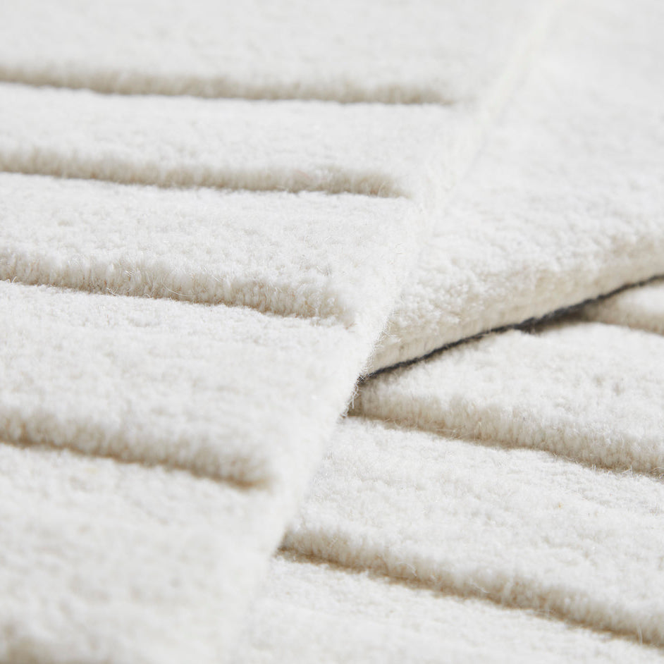 WOUD Kyoto Runner in hand-tufted wool styled in a living room