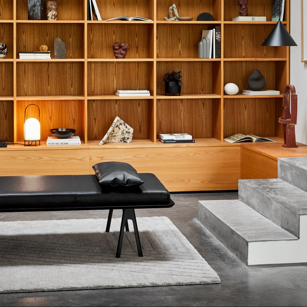 WOUD Kyoto Rectangular Rug in hand-tufted wool styled in a living room