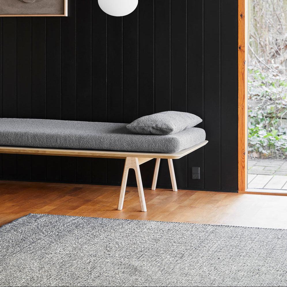 WOUD Rombo Runner in hand-tufted wool styled in a living room