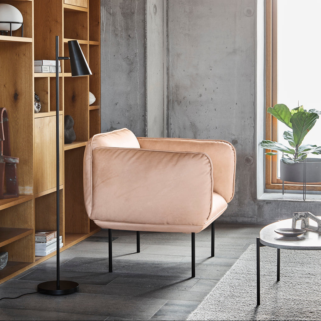 WOUD Cono Floor Lamp in powder-coated steel styled in a living room