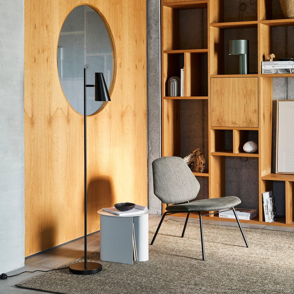 WOUD Cono Floor Lamp in powder-coated steel styled in a living room