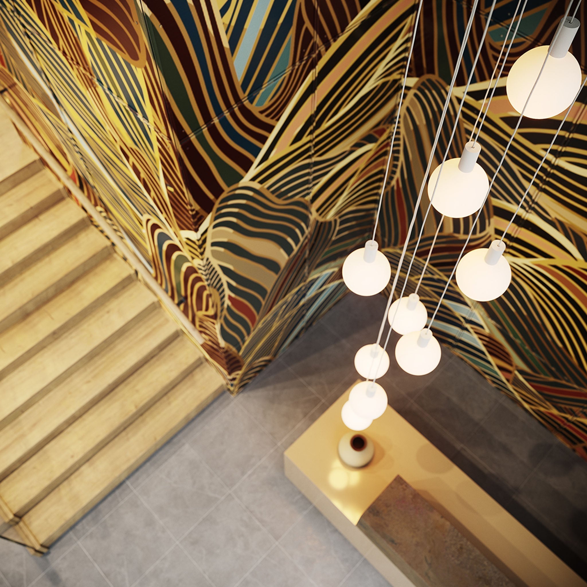 Tala Alumina Nine Pendant with Sphere V bulbs, side angle showing cable drop