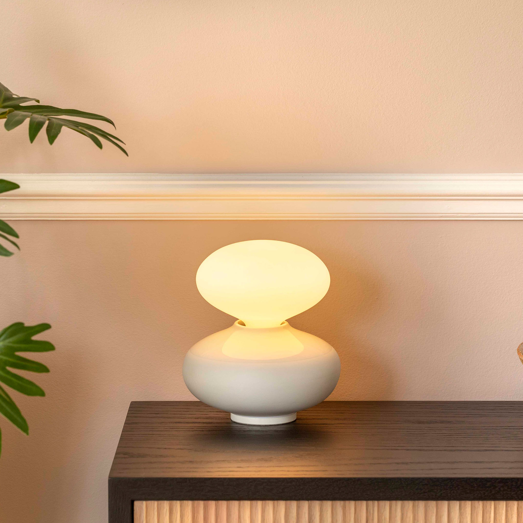 Tala Reflection Oval Table Lamp in a hallway setting