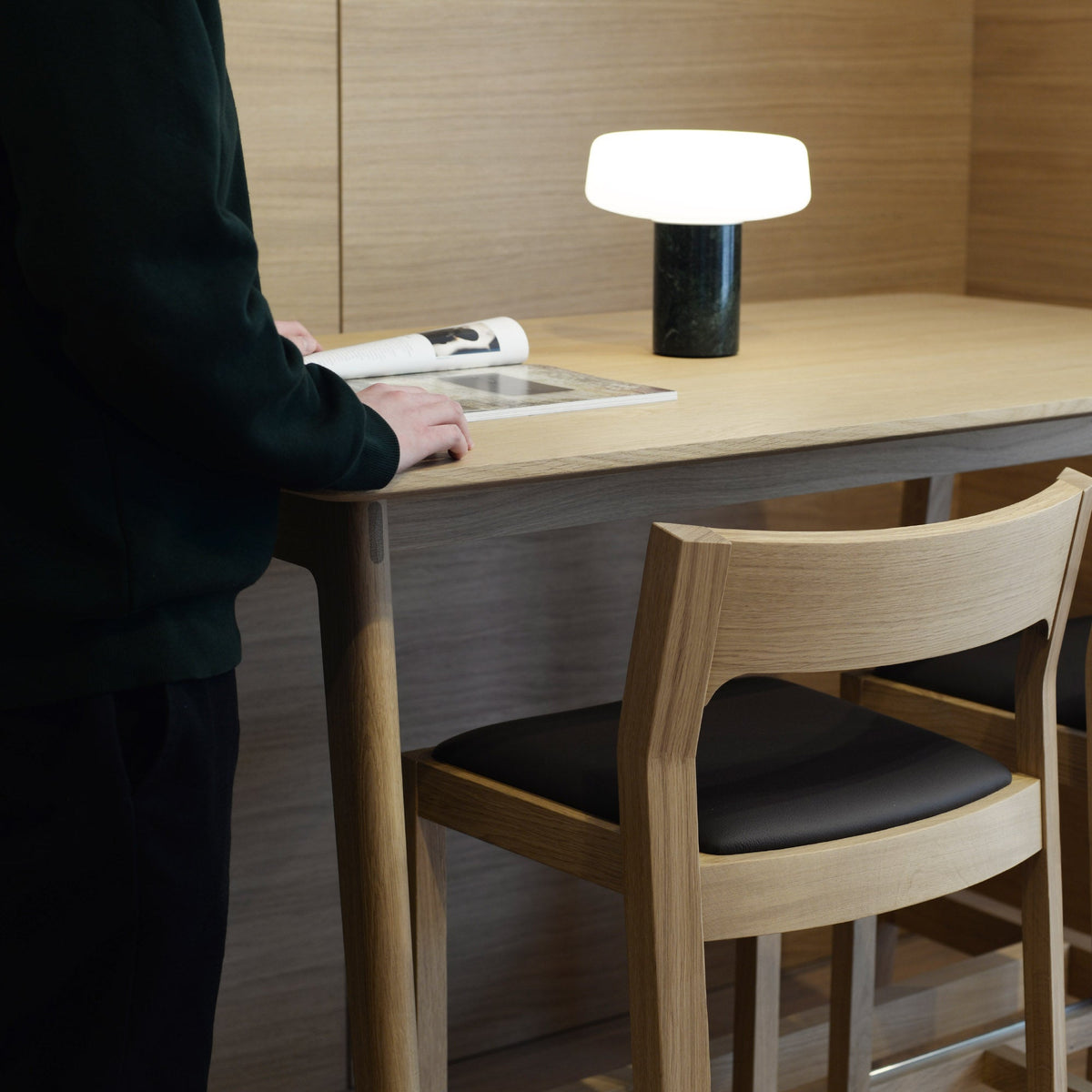 Case Dulwich Bar Table in Oak in use at a kitchen counter, styled in an interior setting, solid oak