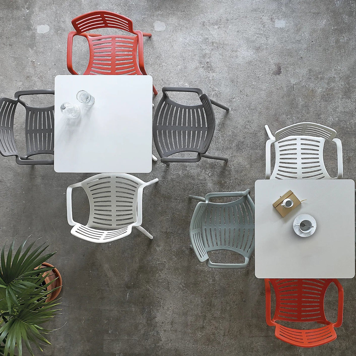 Resol Toledo Tables in Ivory and Green Grey seen from above, styled on a terrace, painted aluminum and HPL
