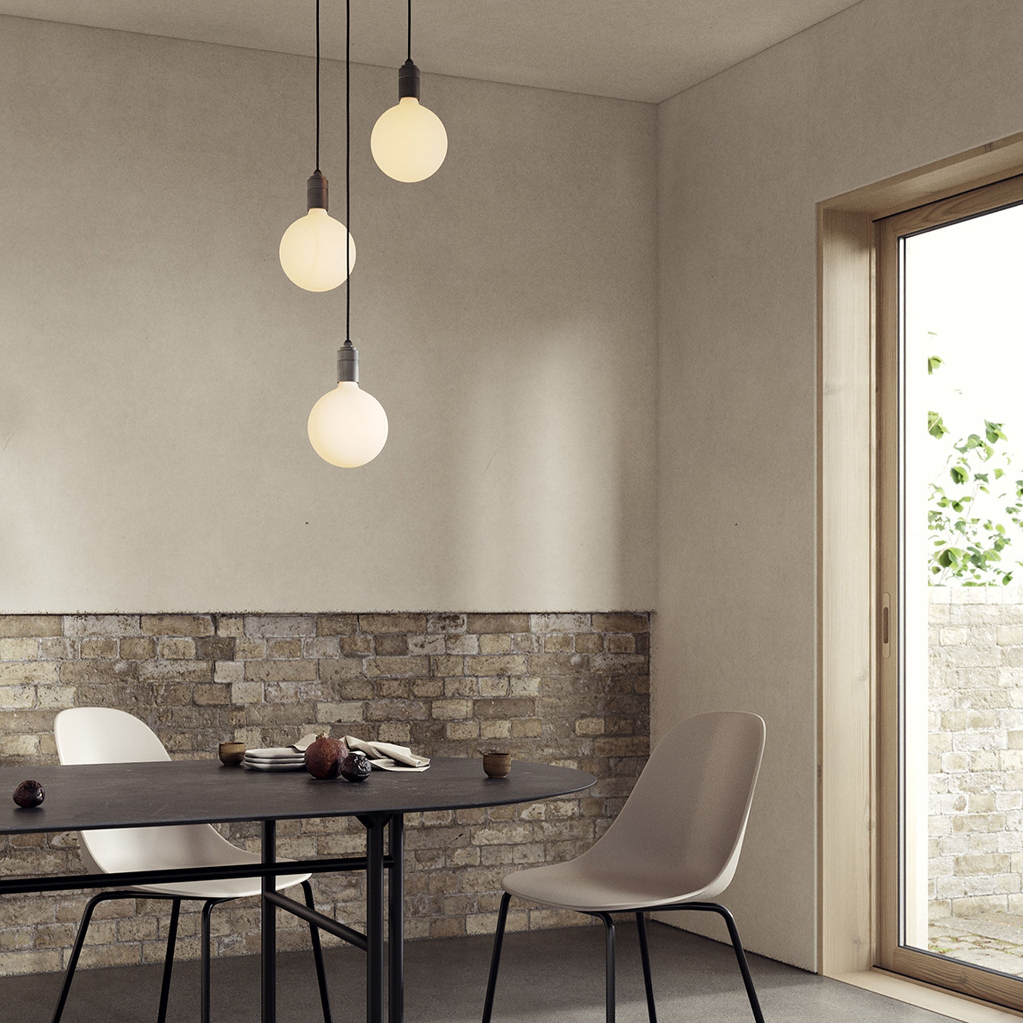 Tala Triple Pendant in Graphite with Sphere IV bulbs — dining room lifestyle
