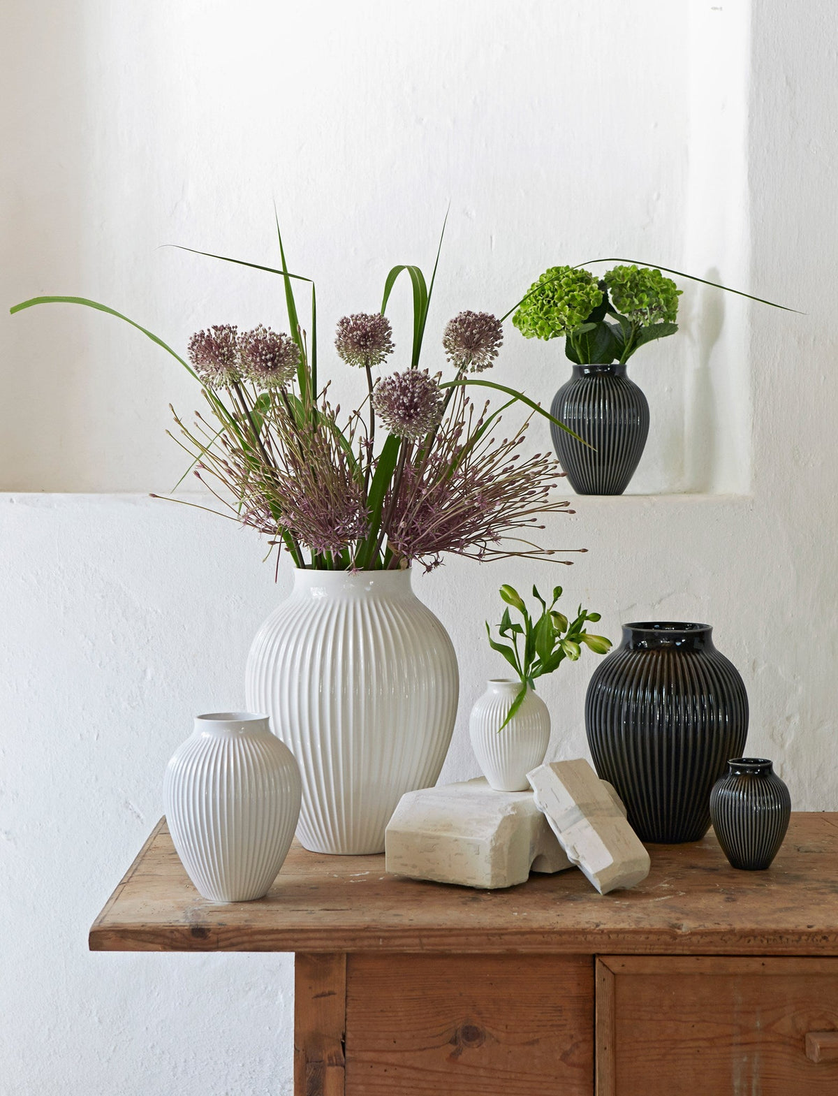 Knabstrup ripple vases in several glazes, styled in an interior setting, glazed earthenware