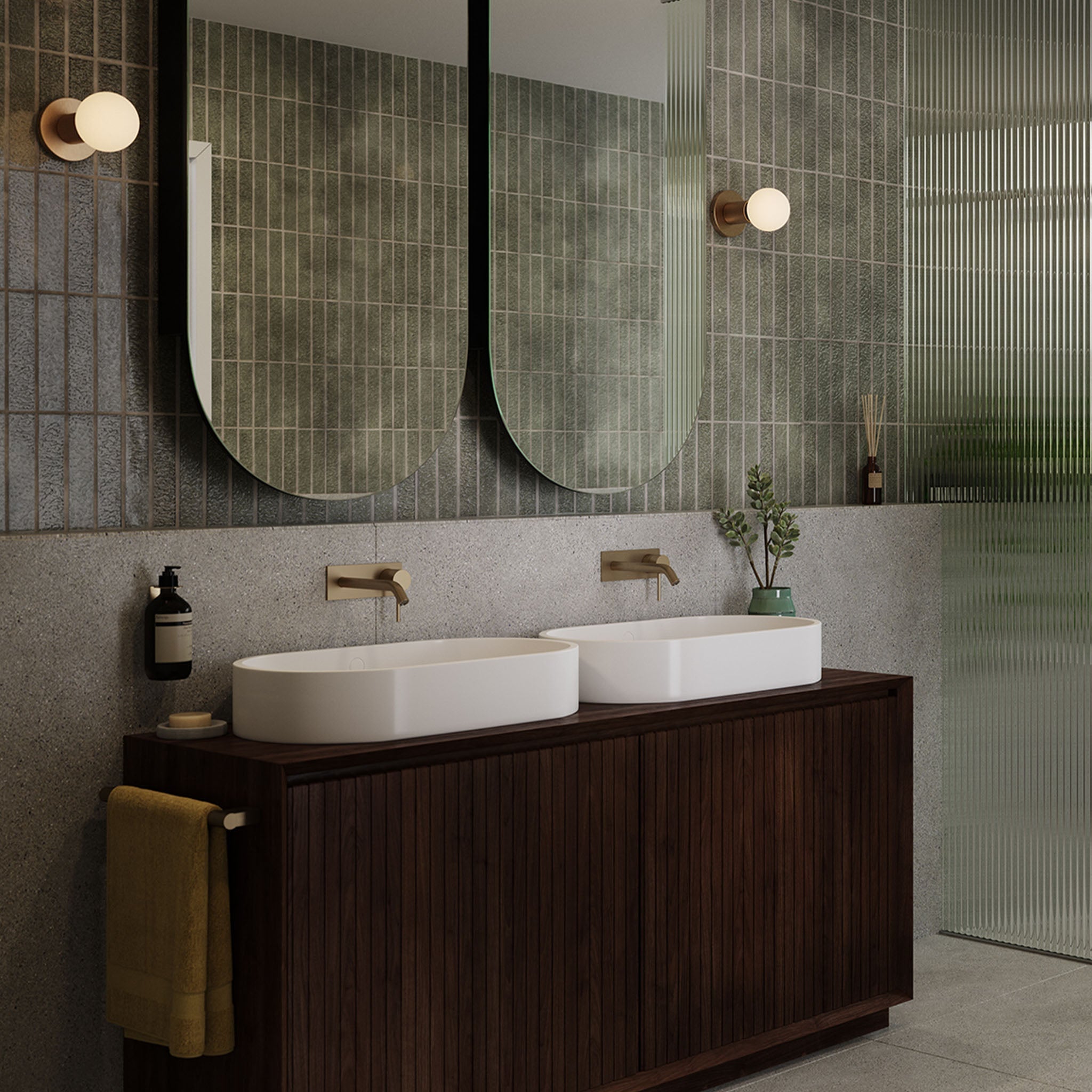 Lochan Wall Light in Brass, pair in bathroom setting