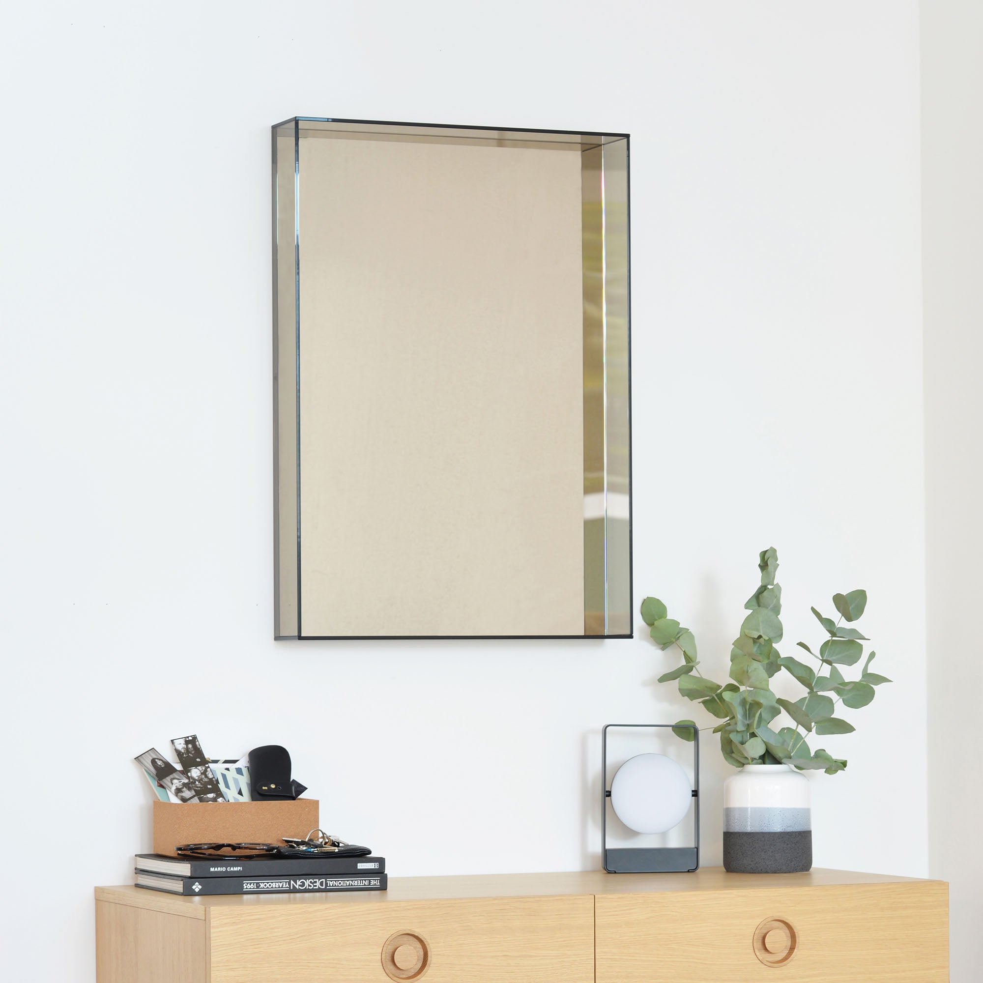 Lucent Mirror in Bronze styled in entryway