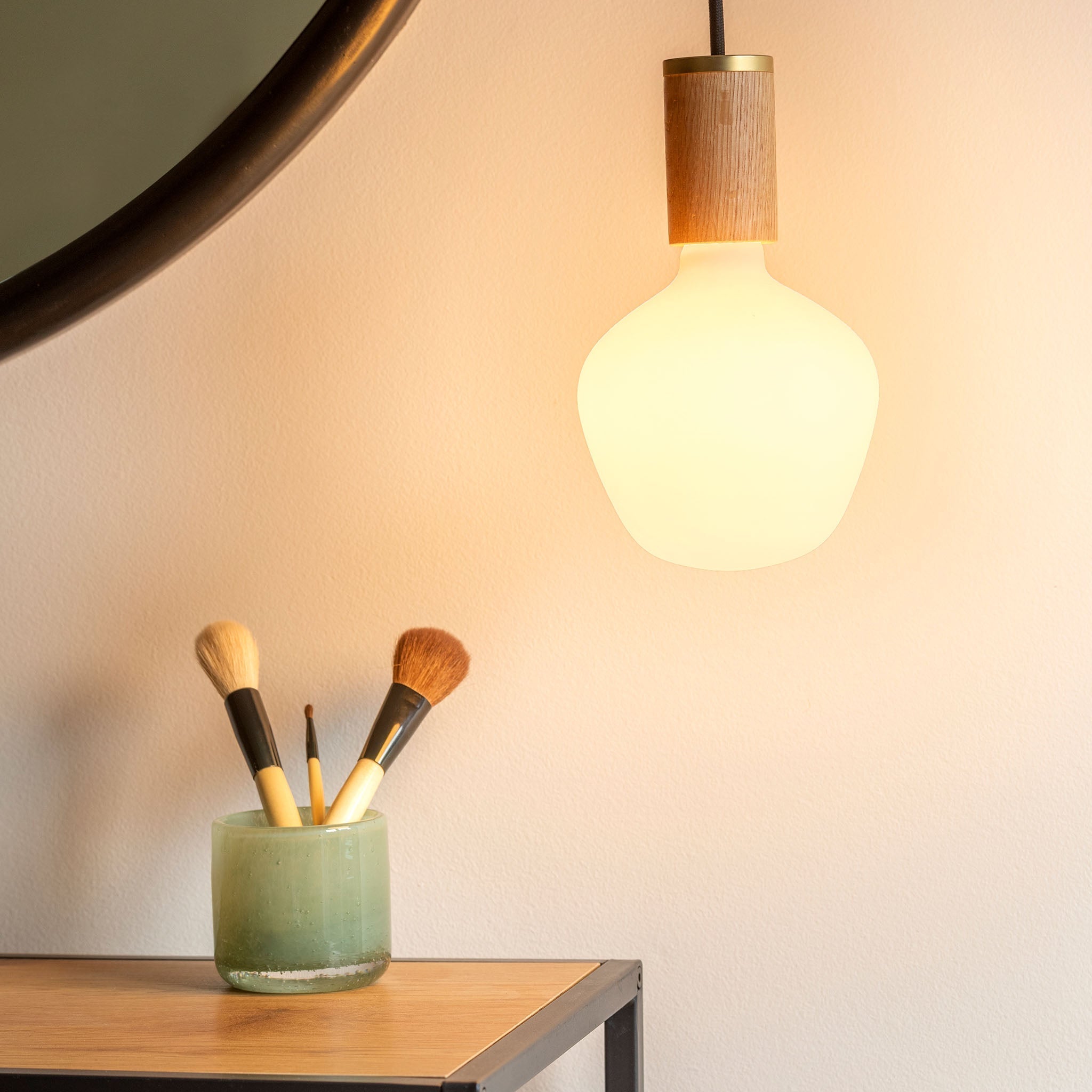 Three-quarter angle of the Enno Pendant Light in Brass