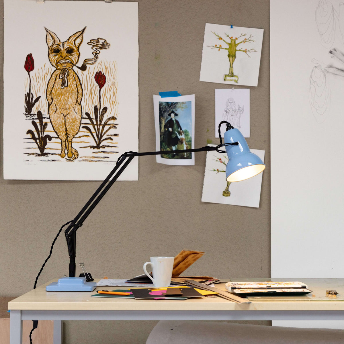 Anglepoise Original 1227 Desk Lamp in Opal Blue and Satin Black, styled in an interior setting, painted steel