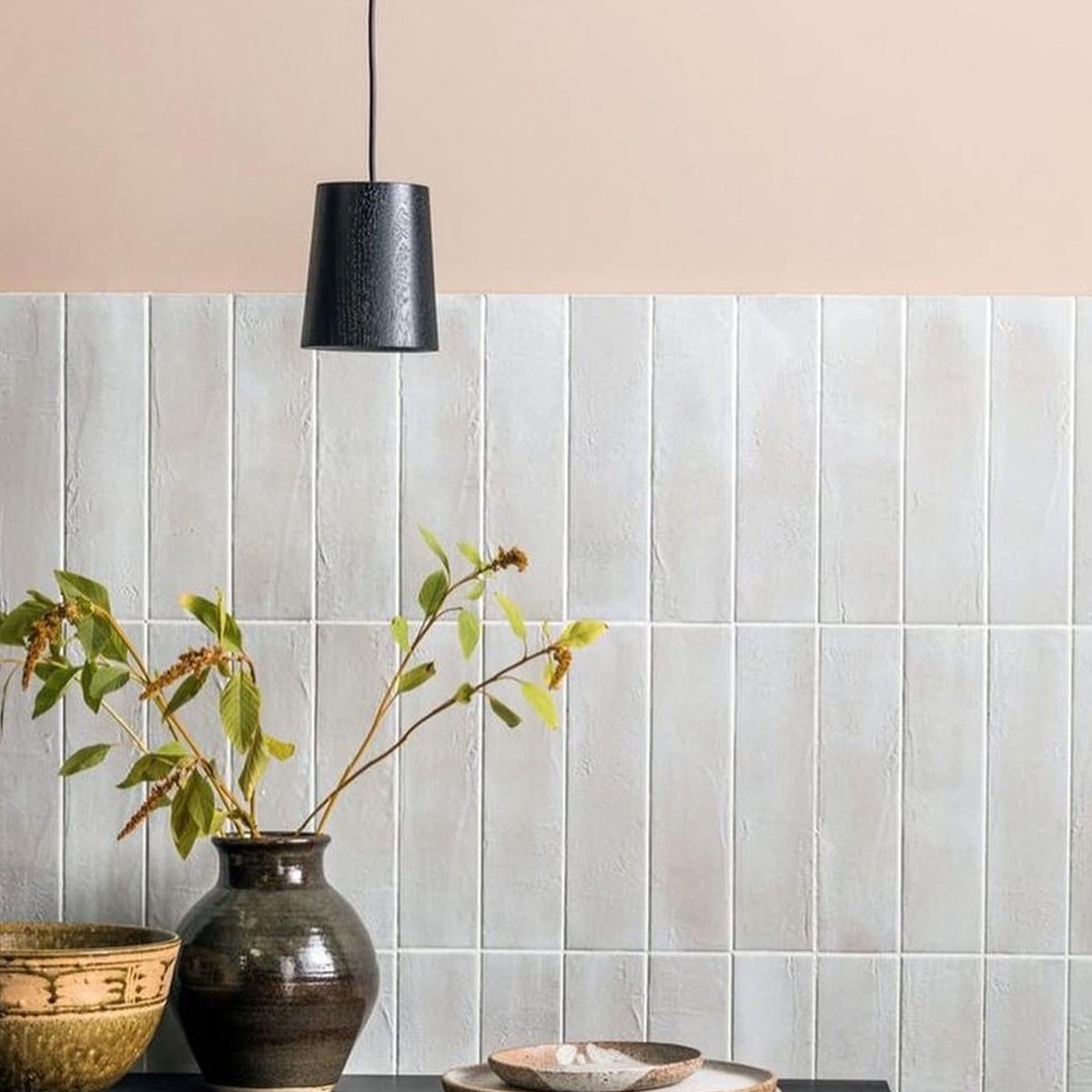 Case Solid Pendant cone in Black Stained Oak (single pendant shown), styled in a kitchen, solid oak
