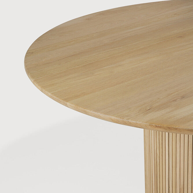 Ethnicraft Roller Max Dining Table in oak styled in a dining room