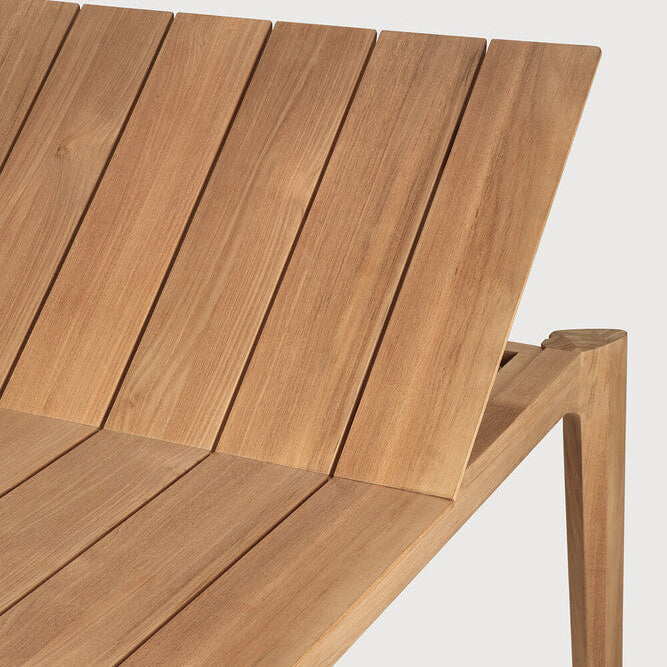 Ethnicraft Bok Outdoor Extendable Dining Table in teak styled in a dining room
