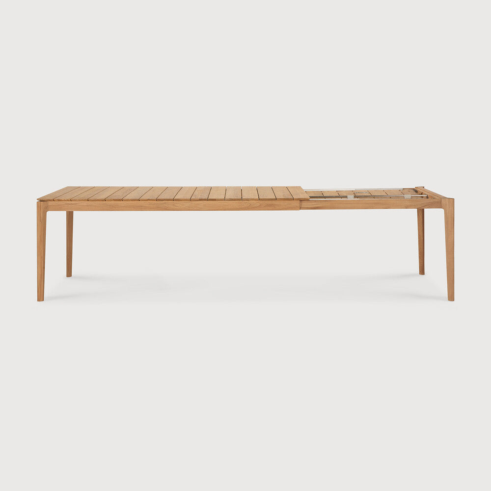 Ethnicraft Bok Outdoor Extendable Dining Table in teak styled in a dining room