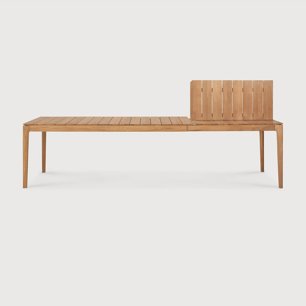 Ethnicraft Bok Outdoor Extendable Dining Table in teak styled in a dining room
