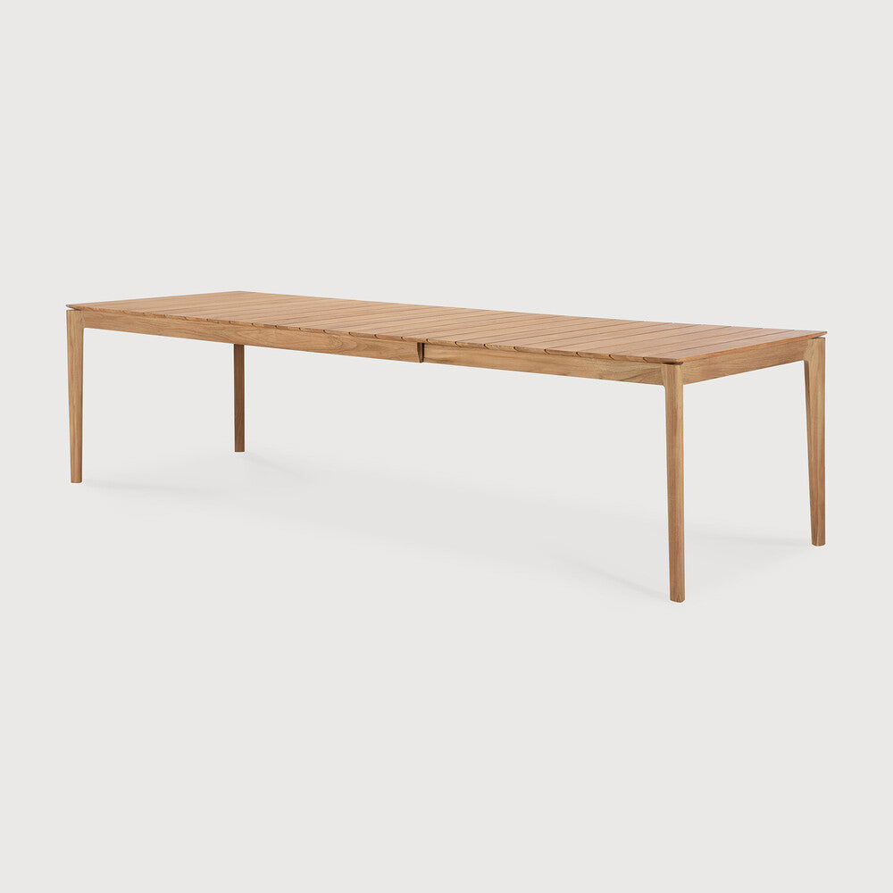 Ethnicraft Bok Outdoor Extendable Dining Table in teak styled in a dining room