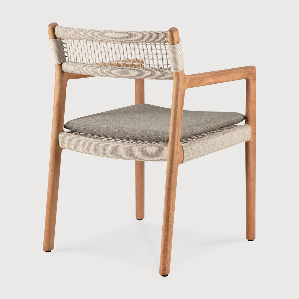 Ethnicraft Jack Woven Outdoor Dining Chair in teak styled in a dining room