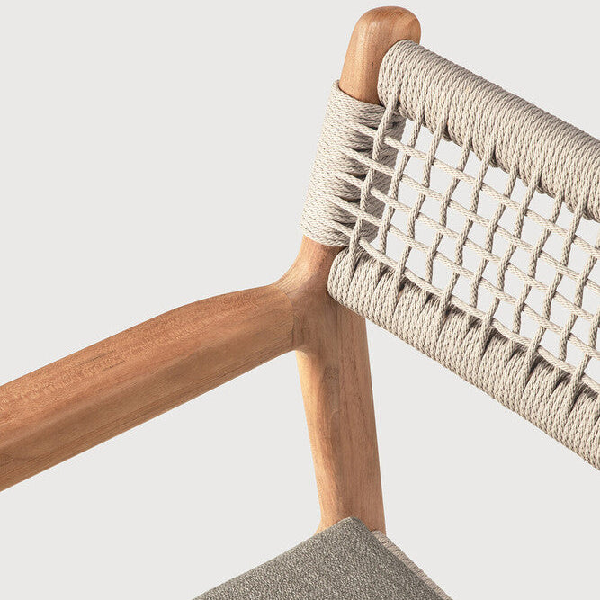 Ethnicraft Jack Woven Outdoor Dining Chair in teak styled in a dining room