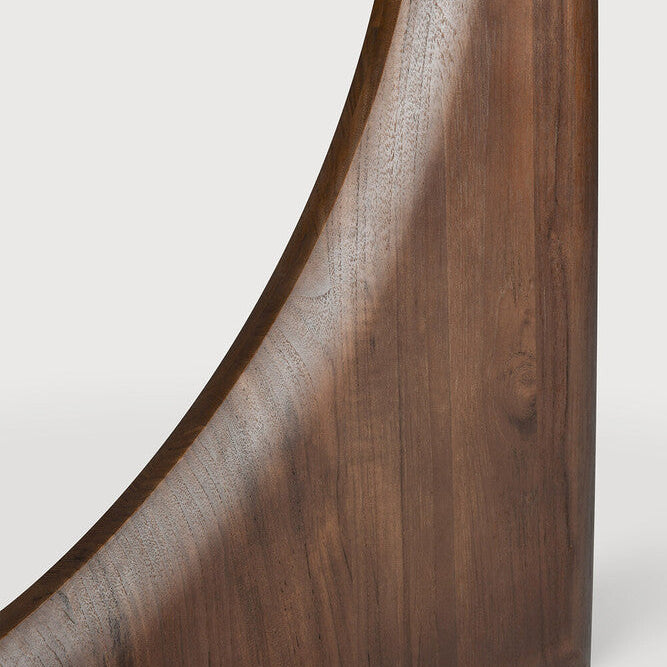 Ethnicraft Geometric Round Dining Table in teak styled in a dining room