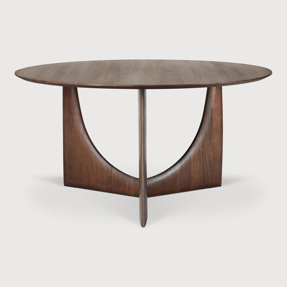 Ethnicraft Geometric Round Dining Table in teak styled in a dining room
