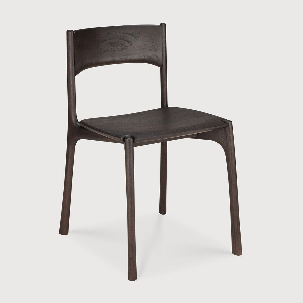Ethnicraft Pi Dining Chair in teak styled in a dining room