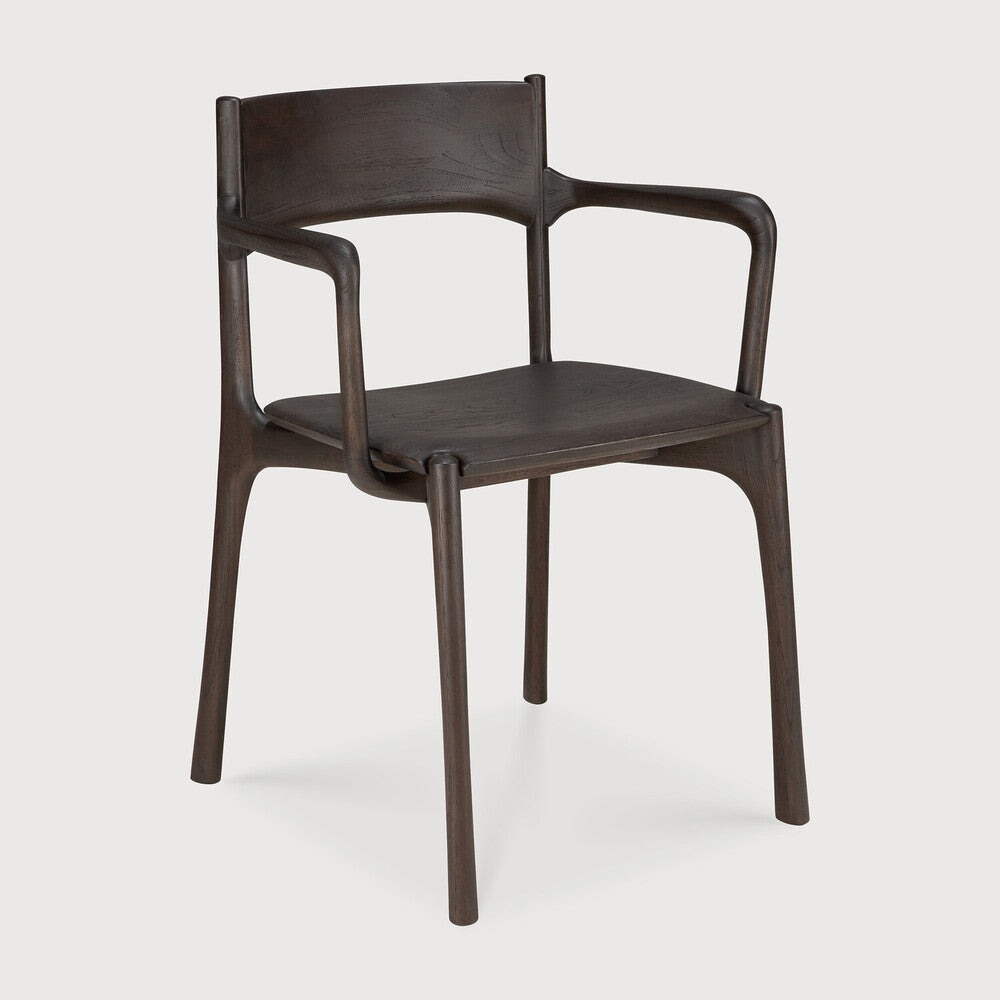 Ethnicraft Pi Dining Chair in teak styled in a dining room
