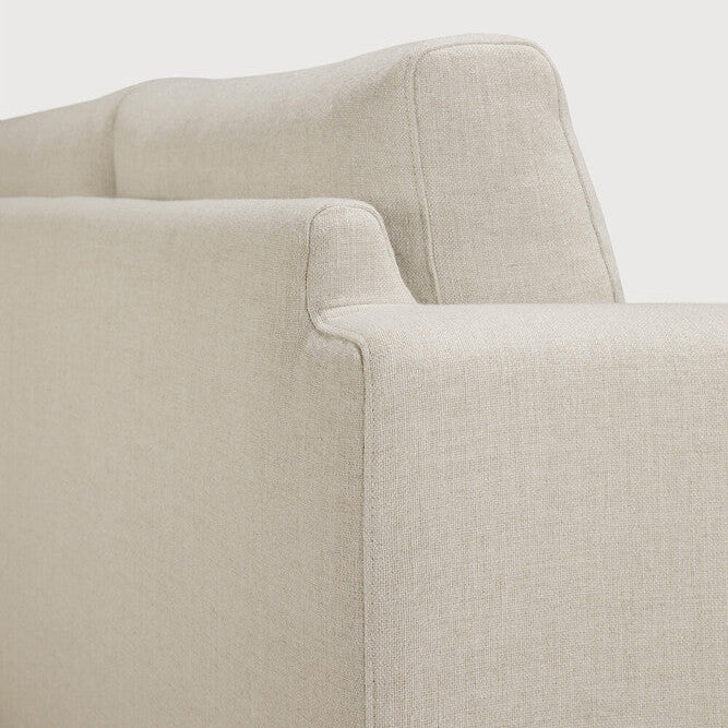 Detail of Ethnicraft Ease Sofa showing the seat and back cushion junction