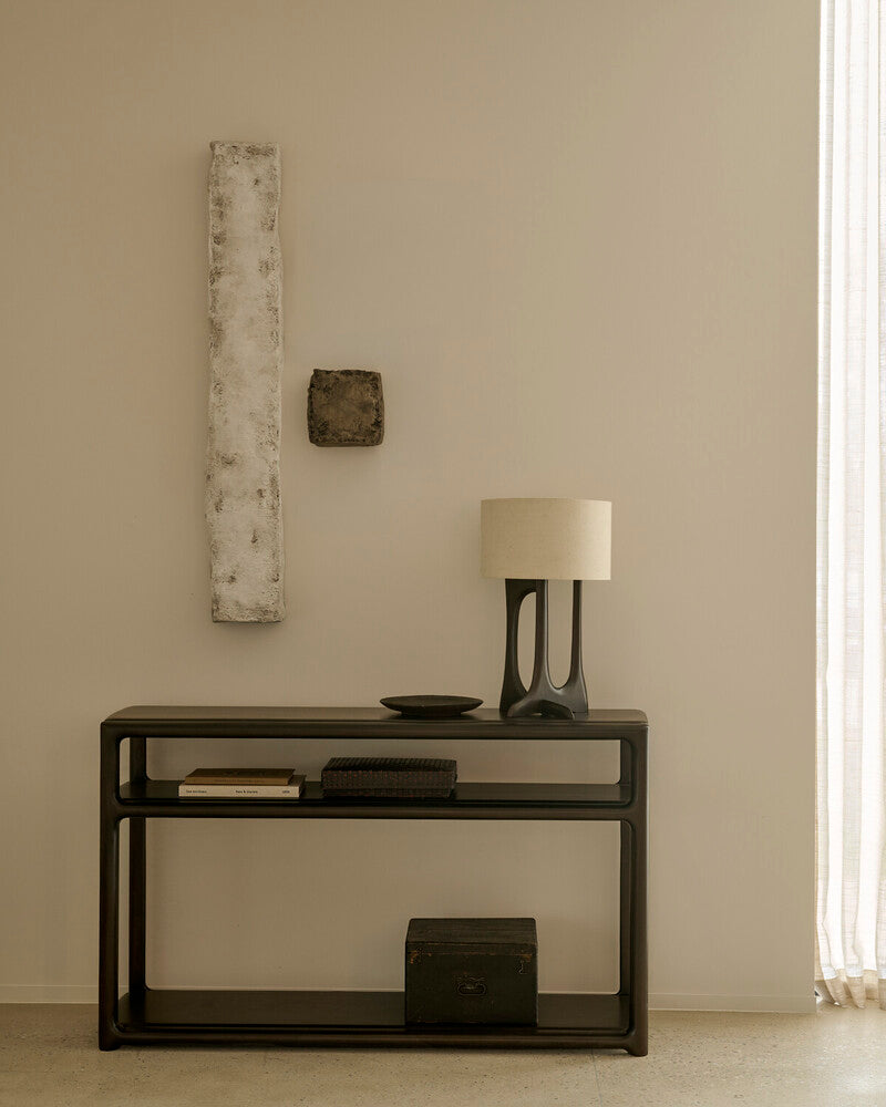Ethnicraft Eda Console in Rose Brown, styled in an interior setting, solid mahogany