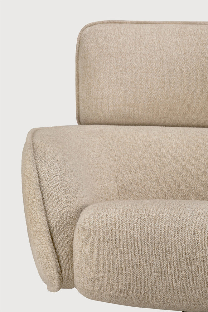 Detail of Ethnicraft Merge Lounge Chair showing the rounded upholstered arm