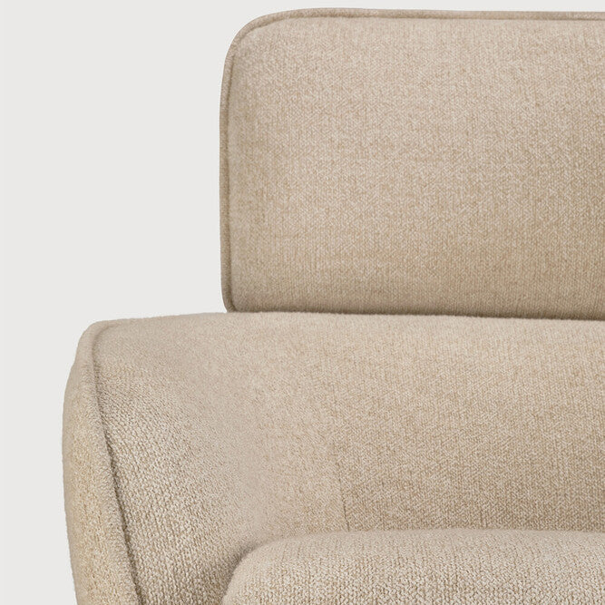Detail of Ethnicraft Merge Lounge Chair showing the rounded upholstered arm
