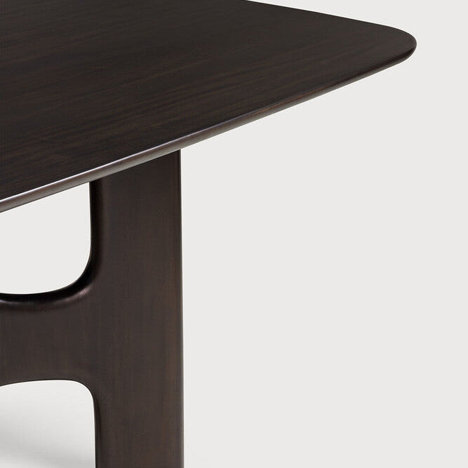 Ethnicraft Flow Dining Table in mahogany styled in a dining room